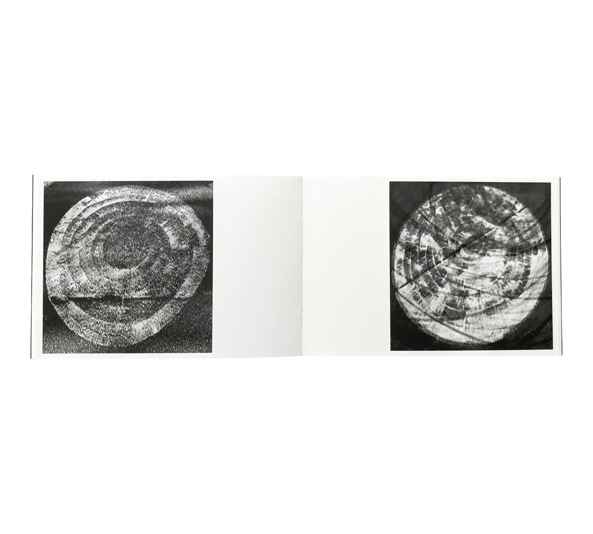 Guy Bigland: Square Photographs of White Circle Paintings